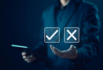 Businessman showing check right and wrong choice The idea is to decide to vote. Think yes or no...