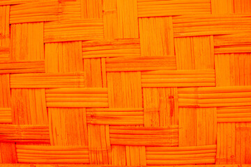 Bamboo weave texture background orange vintage filter effect. Closeup bamboo weave texture background