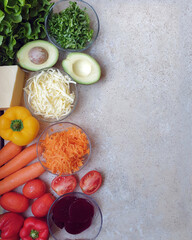 healthy food ingredients on stone table with space for text
