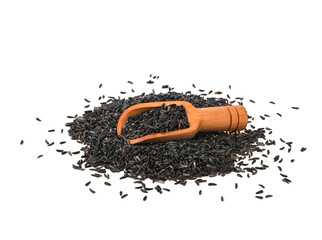 Pile of bird niger seed  with scoop isolated on white background