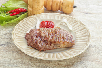 Grilled rib-eye steak beef meat