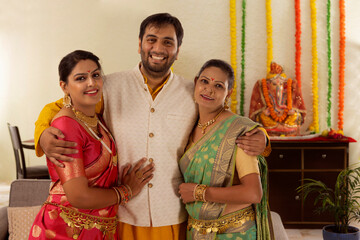Fototapeta na wymiar Maharashtrian Family celebrating Ganesh Chaturthi