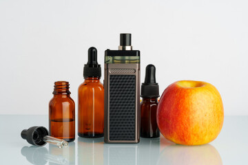 Vape liquid with apple flavor on white background
