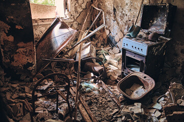 Ukraine, Kharkiv. The remnants of a kitchen that was destroyed and then burned due to the Russian invasion in the Saltivka residential area. - 652649405