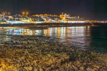 Naklejka premium night view of promenade of Playa Blanca in Lanzarote