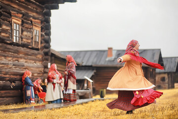 Traditional Slavic rituals in the rustic style. Outdoor in summer. Slavic village farm. Peasants in...