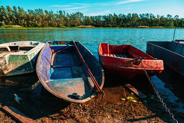 Old worn fishing boats on Danube river