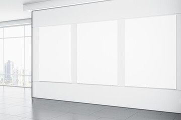 Modern gallery interior with empty mock up posters on white concrete wall, flooring with reflections and window with city view and daylight. 3D Rendering.