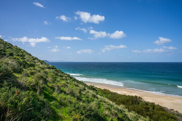 lookout at the beach over white sand in summer