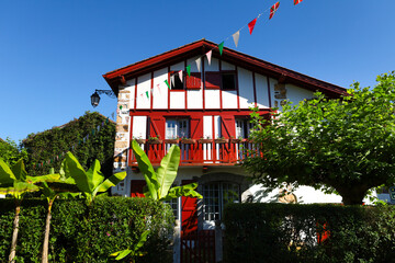 Traditional and colorful half-timbered houses with garden in Ainhoa