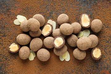 Tasty and sweet food - almonds in chocolate