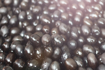 black olives close-up, dense texture