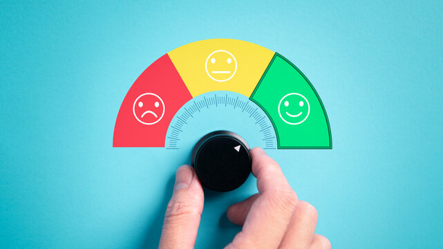 Customer hands adjusting and giving satisfaction indicators for rating sales and services on a blue background. Business owner and Small Medium Entrepreneur concept.