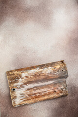wooden cutting board on concrete background. rustic style, Food cooking background. top view
