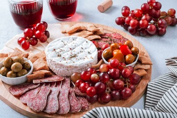 Charcuterie Board with Various Kinds of Snacks