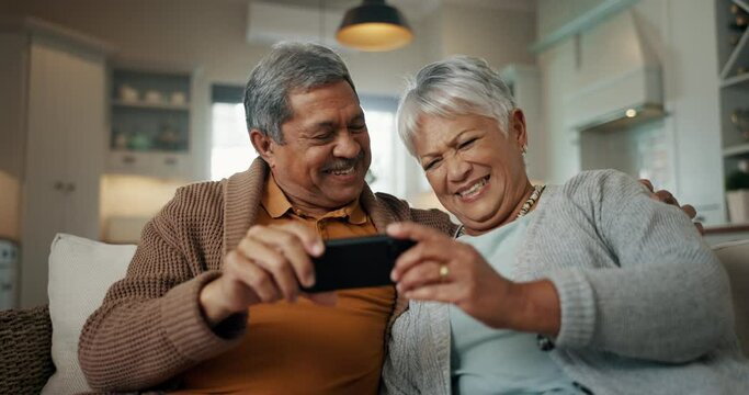 Senior couple, home and selfie while laughing on sofa and enjoying retirement together. Social media, smile and happy pensioners in house with playful energy as elderly people take profile picture