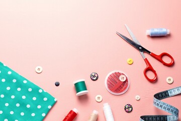 Sewing Tools and Accessories Composition on Pink Background - obrazy, fototapety, plakaty