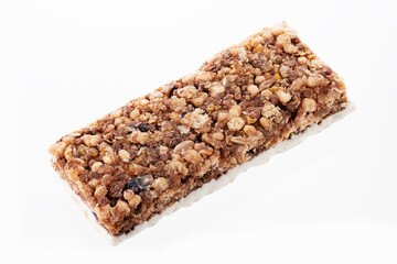 Oat and nut bar isolated on white. Granola bar. Healthy sweet dessert snack. Cereal granola bar with nuts, fruit and berries. Healthy munchies. 