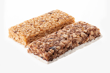 Oat and nut bar isolated on white. Granola bar. Healthy sweet dessert snack. Cereal granola bar with nuts, fruit and berries. Healthy munchies. 