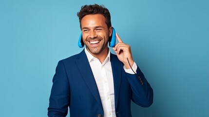 Portrait of a satisfied businessman using a phone and showing a smiling gesture against a blue background. AI-Generated - obrazy, fototapety, plakaty