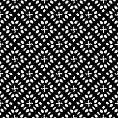 White background with black pattern. Seamless texture for fashion, textile design,  on wall paper, wrapping paper, fabrics and home decor. Simple repeat pattern.