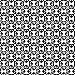 White background with black pattern. Seamless texture for fashion, textile design,  on wall paper, wrapping paper, fabrics and home decor. Simple repeat pattern.