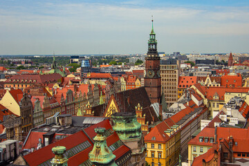 City hall and multicolored houses on the Market square at Old Town in Wroclaw, Poland. View from the Bridge of Penitents of Cathedral of St. Mary Magdalene