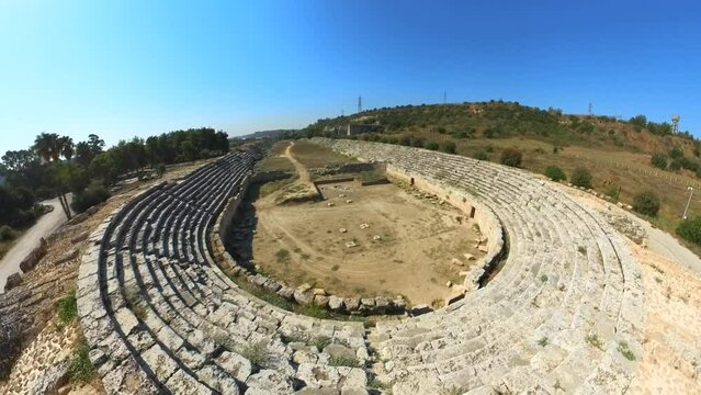 Aerial view on well-preserved ruins of the stadium of Perge City of Turkey. Once accommodated thousands of spectators who gathered to enjoy performances and entertainment.