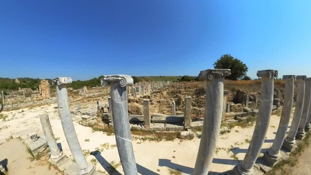 Visitors to Perge town, can explore its grand colonnaded streets, admire intricate mosaics, and stand in awe of its monumental architecture. Aerial view on ancient ruins of Perge city of Turkey.
