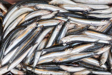 Fresh, glistening boquerones catch your eye at the bustling fish market.