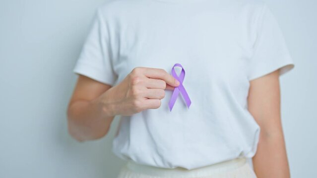 Woman having abdomen Pancreas and Chest pain with Purple ribbon. Pancreatic cancer November awareness month, Pancreatitis, Digestive system, World Cancer day and Health concept