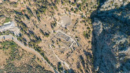 Delphi, Greece. Ruins of the ancient city of Delphi. Sunny weather in the morning, Summer, Aerial View