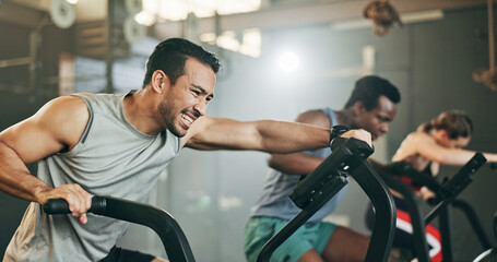 People, diversity and cycling at gym in fitness, workout or intense cardio exercise together and...