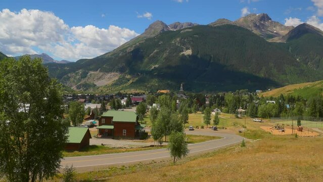 Cinematic peaceful breeze colorful Colorado stunning summer blue bird morning noon historic downtown Silverton Durango Telluride Rocky Mountains landscape slow motion still