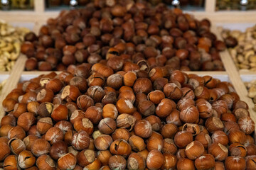 Dry groundnuts are kept out for sale for consumption