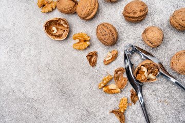 Walnut and nutcracker on vintage background