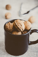 Walnut and nutcracker on vintage background