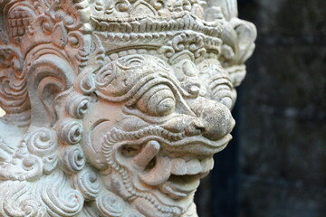 Traditional old ancient Balinese mask demon angel guarding sacred ritual temple