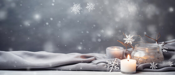 Fototapeta na wymiar Christmas cozy still life composition with candles, snowflakes, decoration on grey concrete texture background. New year banner, mockup. Generative ai.