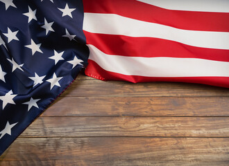 american flag lay on wooden table with copy space