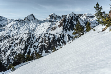 Snow-covered mount of Pyrenees against the blue sky in winter