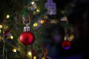 Closeup shot of beautiful Christmas decorations hanging on the Christmas tree for the New Year