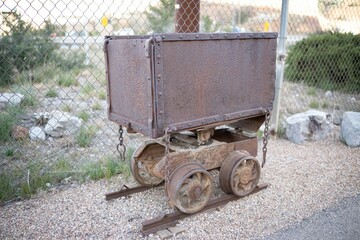 Antique railroad mine cart sits atop rail tracks in Bisbee, Arizona
