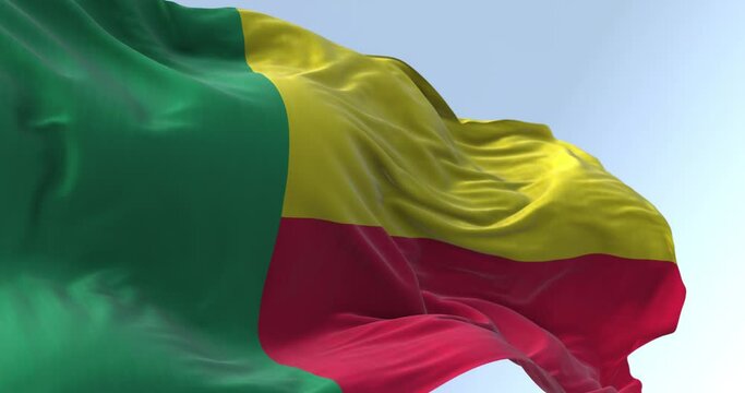 Close-up of Benin national flag waving on a clear day