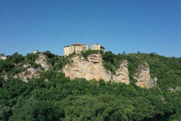 Fototapeta na wymiar View of Bruniquel castle in scenic green terrain, France