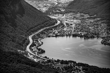 Lugano Lake, Italian: Lago di Lugano. Lookout from Balcony of Italy on Mount Sighignola. Italy and Switzerland. Black and white photography.