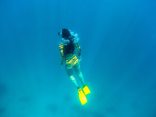women diver in the sea