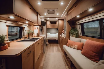 Fotobehang Travel transport and entertainment concept. Cosy Interior of motor home camping car, furnishing wooden decor of salon area, comfortable modern caravan house vehicle. Relaxation areas for road travel © Valeriia