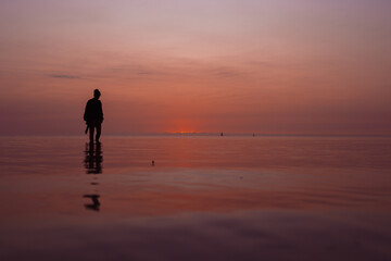 women walking on the Jambiani beach