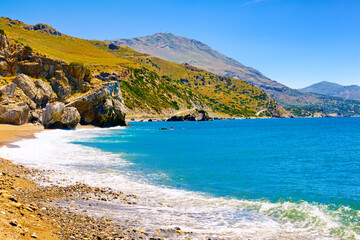Panorama of sunny day at Preveli beach, Crete island, Greece.